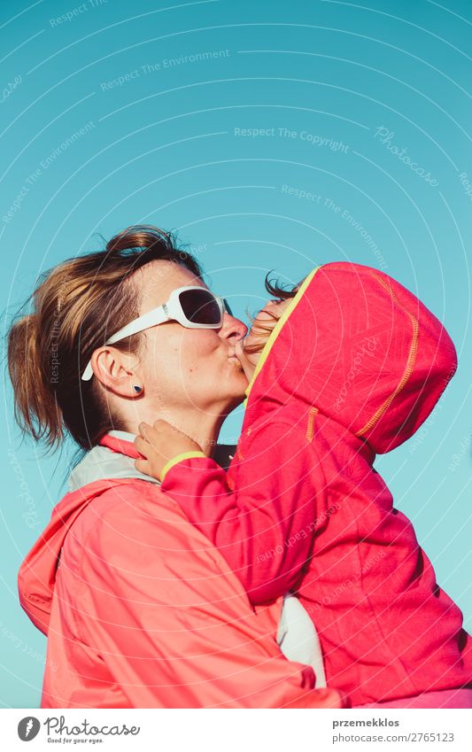 Mother hugging with her little daughter outdoors Lifestyle Joy Happy Beautiful Vacation & Travel Summer Child Human being Woman Adults Parents