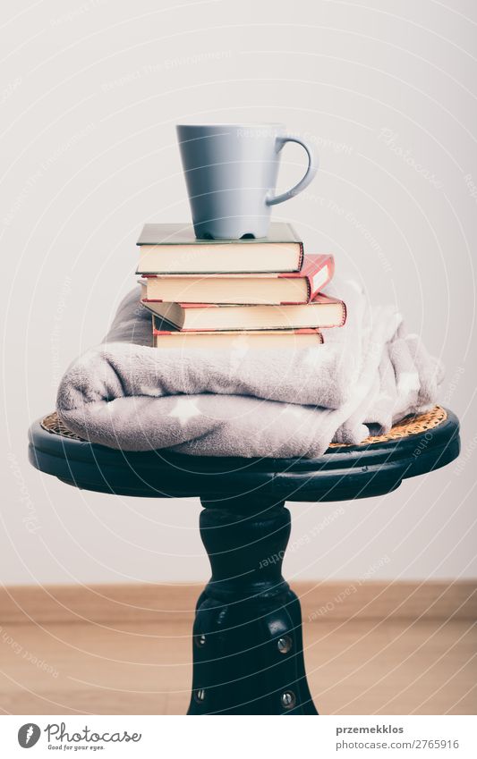 A few books with cup of coffee and blanket on wooden chair Coffee Mug Lifestyle Relaxation Leisure and hobbies Reading Chair Book To enjoy Brown