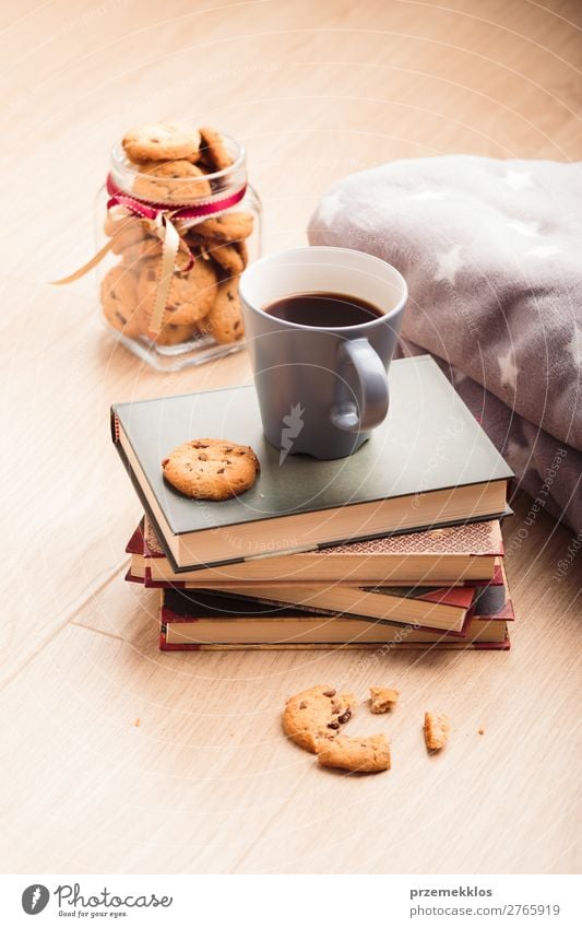 A few books with cup of coffee and cookies on wooden floor Dessert Nutrition Eating Diet Coffee Mug Lifestyle Relaxation Leisure and hobbies Reading Table Book