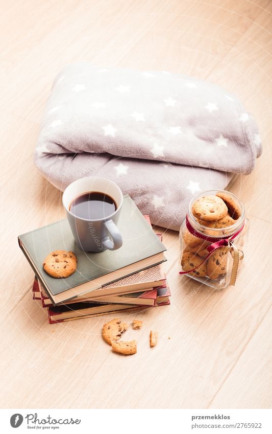 A few books with cup of coffee and cookies on wooden floor Dessert Nutrition Eating Diet Coffee Mug Lifestyle Relaxation Leisure and hobbies Reading Table Book