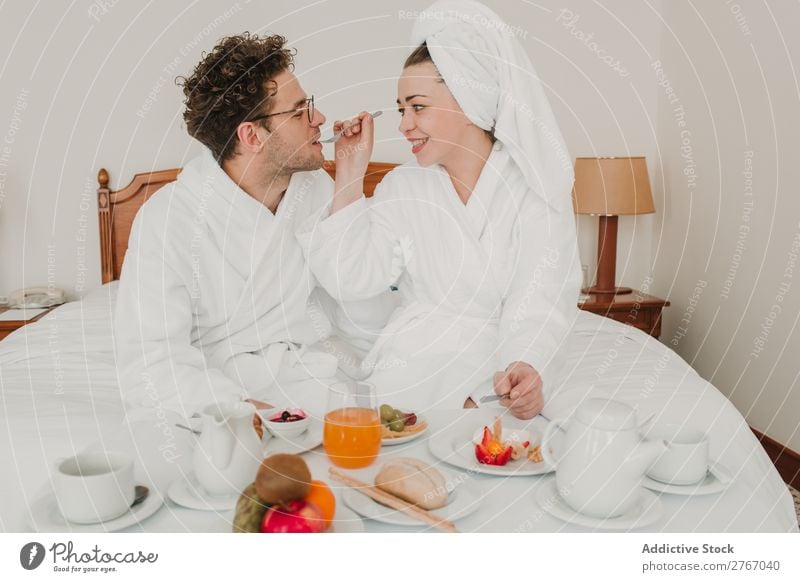 Couple having breakfast in hotel Eating Breakfast Together Room service Bathrobe Hotel Bedroom Home Interior design Furniture Flat (apartment) Design