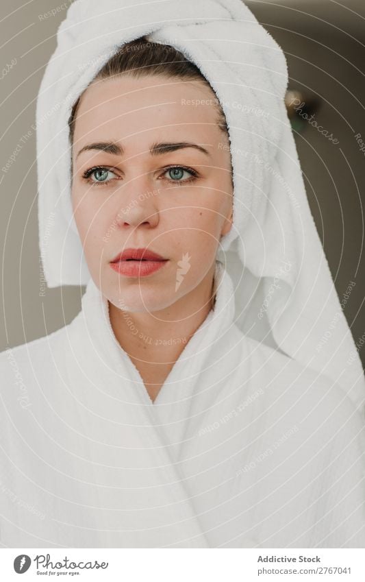 Thoughtful woman posing in bathrobe Woman Towel Bathrobe Hot Self-confident Youth (Young adults) pretty Looking away Stand Considerate Hotel Room Home