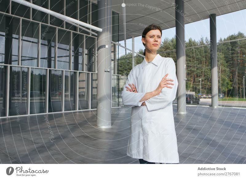 Woman in whites at modern building Laboratory Work and employment Science & Research Building Modern Contemporary Human being Scientist Medication Chemistry