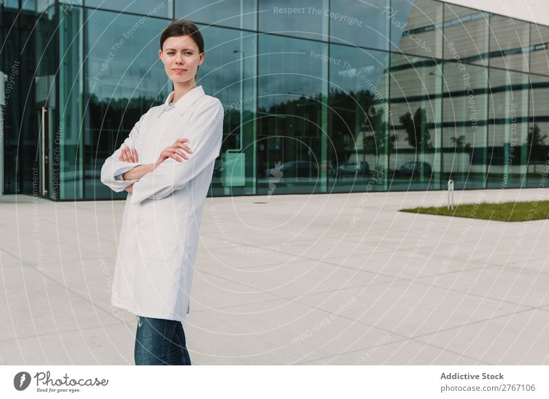 Woman in whites at modern building Laboratory Work and employment Science & Research Building Modern Contemporary Human being Scientist Medication Chemistry