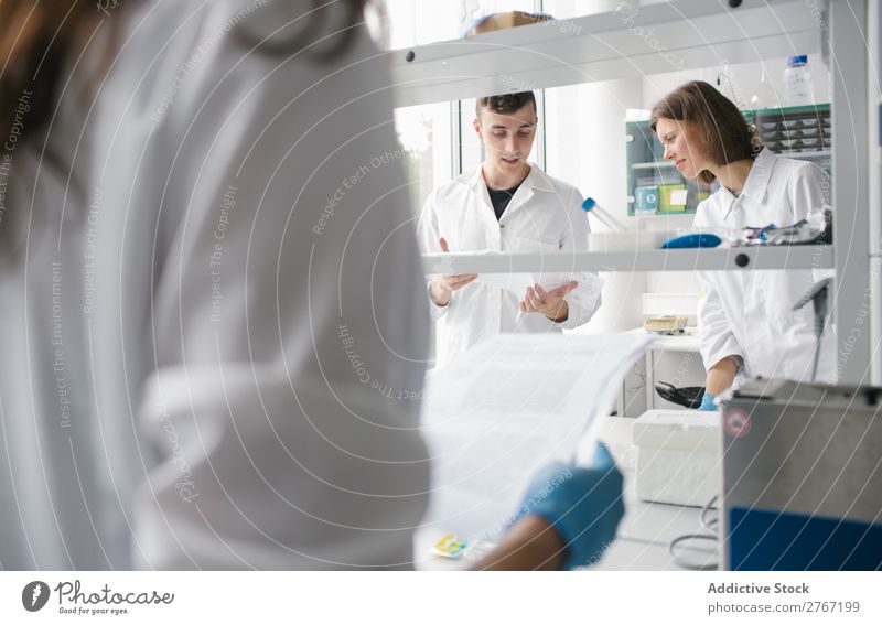 People co-working in lab Laboratory Work and employment Science & Research Woman Man Human being Scientist Medication Chemistry Technology Doctor experiment