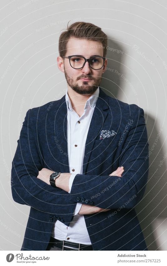 Young stylish man at white wall Man Suit Style handsome arms crossed Person wearing glasses Wall (building) Fashion Youth (Young adults) Portrait photograph