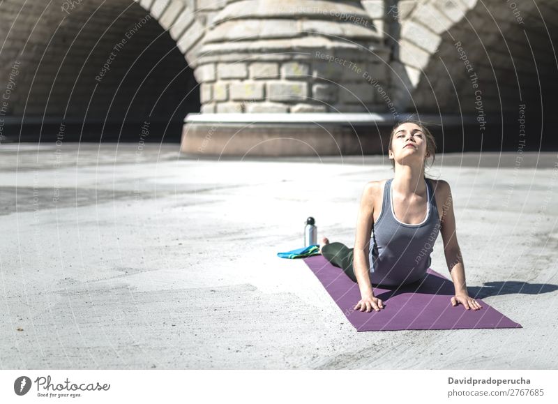 woman doing yoga and pilates outdoor with her mat Lifestyle Beautiful Body Relaxation Meditation Sports Yoga Human being Woman Adults Nature Warmth Park