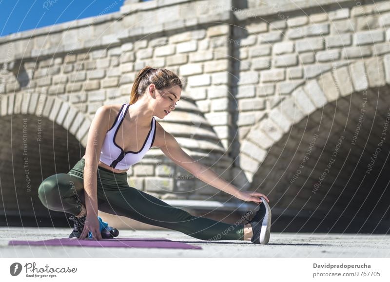 woman doing yoga and pilates outdoor with her mat Lifestyle Beautiful Body Relaxation Meditation Sports Yoga Human being Woman Adults Nature Warmth Park