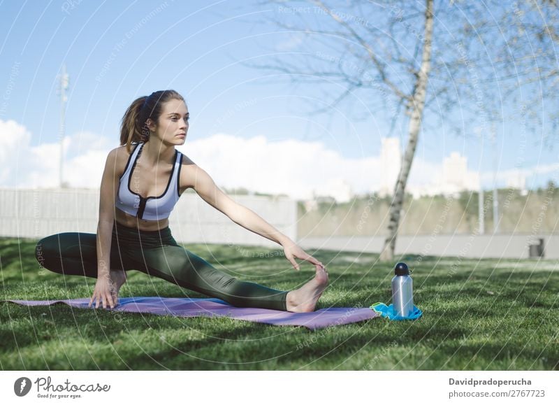 woman doing yoga and pilates outdoor with her mat Lifestyle Beautiful Body Relaxation Meditation Sports Yoga Human being Woman Adults Nature Warmth Park