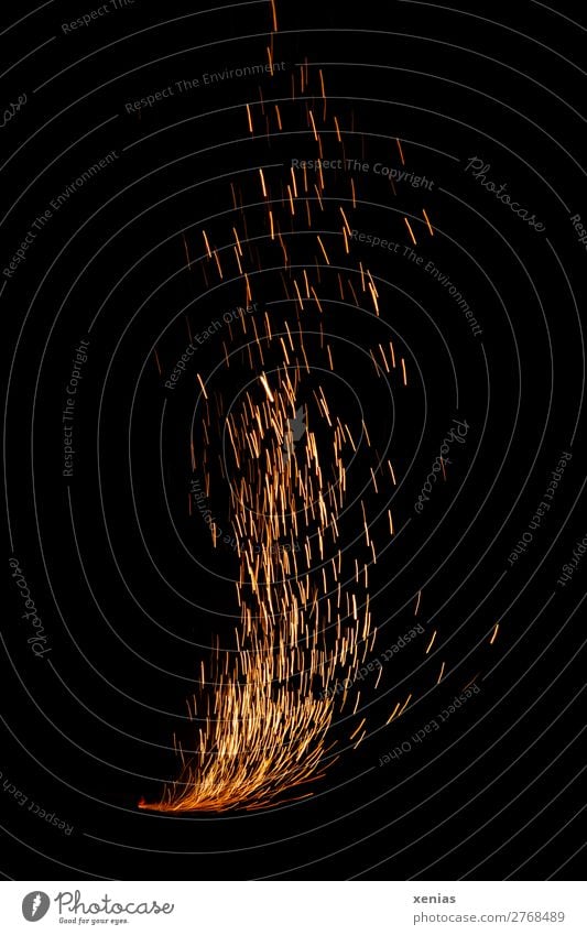 sparks New Year's Eve Shows Fire Illuminate Hot Yellow Orange Black Threat Burn Spark Spray Dangerous Risk New Year's firecracker Firecracker Pyrotechnics Shoot