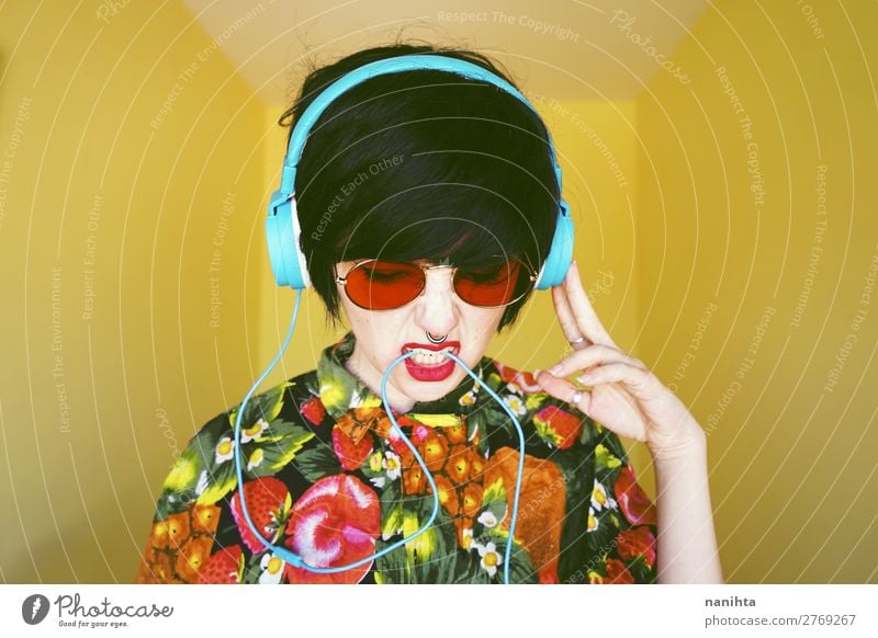 Cool androgynous dj woman in vibrant colors Style Design Hair and hairstyles Summer Party Music Disc jockey Headset Technology Entertainment electronics