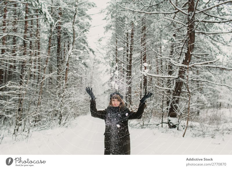 Cheerful woman having fun in winter forest Woman Forest Winter Snow Cold Nature Youth (Young adults) Jump Joy Street Lanes & trails White Beautiful Happy