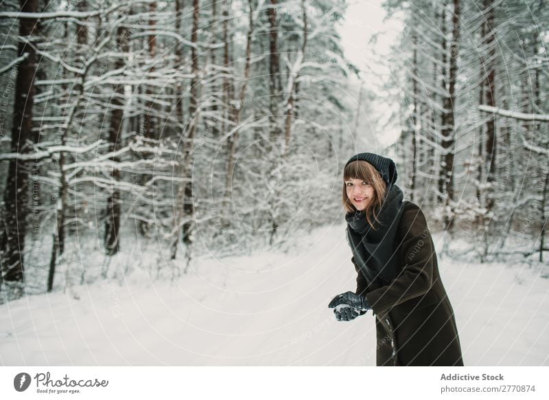 Cheerful woman having fun in winter forest Woman Forest Winter Snow Cold Nature Youth (Young adults) Joy Street Lanes & trails White Beautiful Happy Seasons