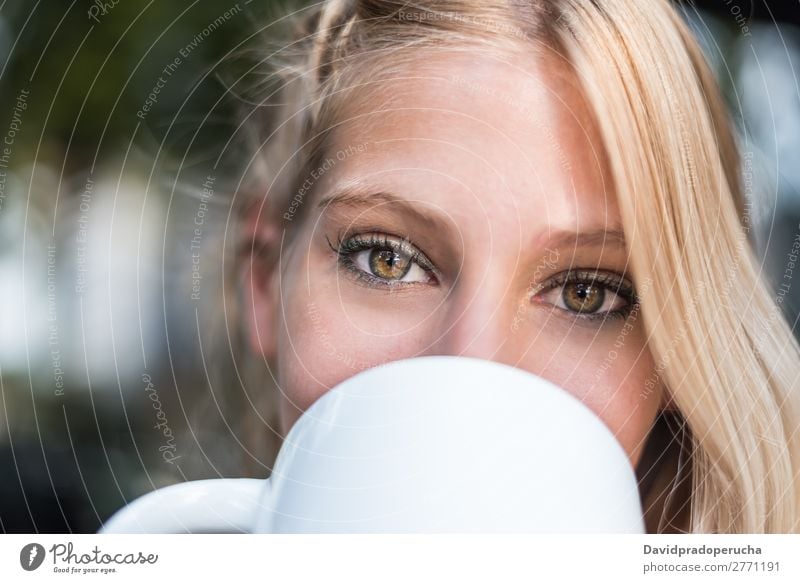 head shot of a beautiful woman eyes drinking a cup of coffee Woman Eyes Smiling Coffee Cup Terrace Restaurant Portrait photograph Cafeteria Student Isolated