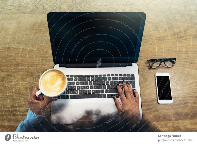 Beautiful afro american woman using mobile and laptop in the coffee shop. Woman Black African Afro Business Coffee Businesswoman Cellphone Youth (Young adults)