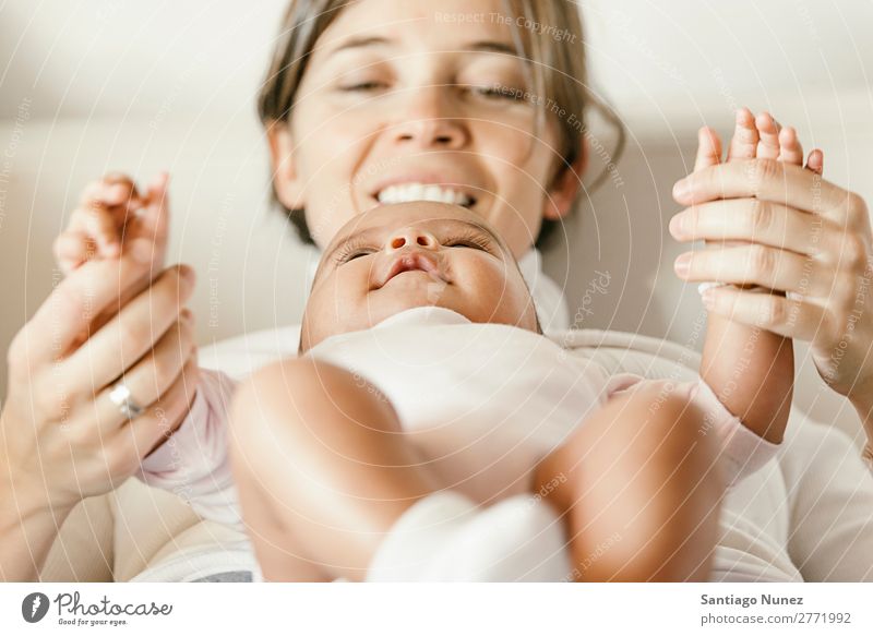 Portrait of a mother with her baby at home. Baby Mother Youth (Young adults) Beautiful motherhood Child Considerate Family & Relations Love Human being