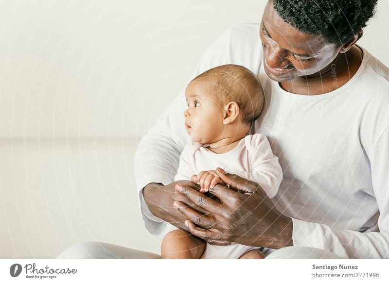 Happy Father and baby Have Fun. Baby Boy (child) Child Girl Hold Newborn multiethnic Parents Black Family & Relations Love African diverse Human being Smiling