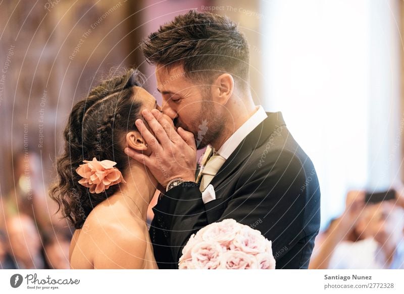 Couple of just married kissing in the church. Wedding Kissing Love Beautiful Ceremony White Beauty Photography Bride Husband Wife Woman Married