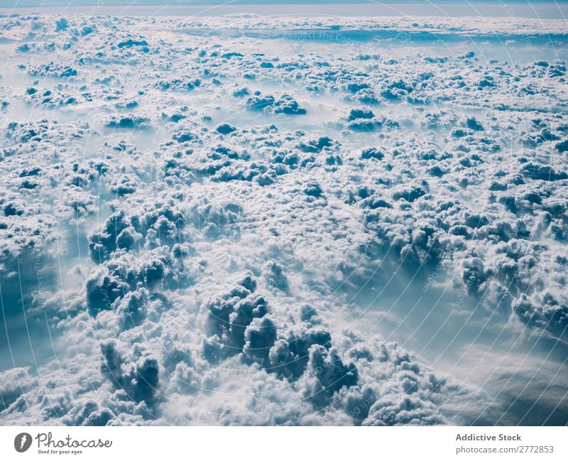 Fluffy clouds in sunlight Clouds Sunlight Sky Cumulus Landscape Haze Climate Environment Light cloudscape Bright Universe Beauty Photography Nature Atmosphere