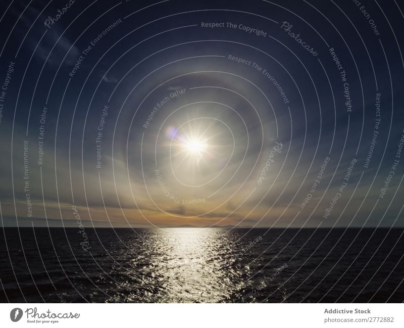 Sun phenomenon above sea Ocean Sunlight Panorama (Format) Water Phenomenon Background picture Halo Landscape Horizon Morning Paradise tranquil Seasons