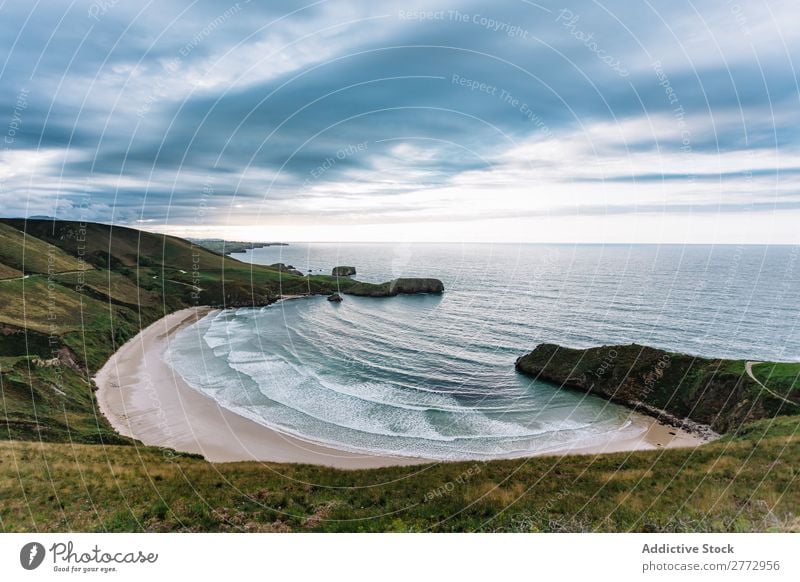 Ocean lagoon in cliff formation Coast Lagoon Cliff Landscape Turquoise Wilderness Cloud cover scenery Calm seaside Dramatic Deserted Vacation & Travel Summer