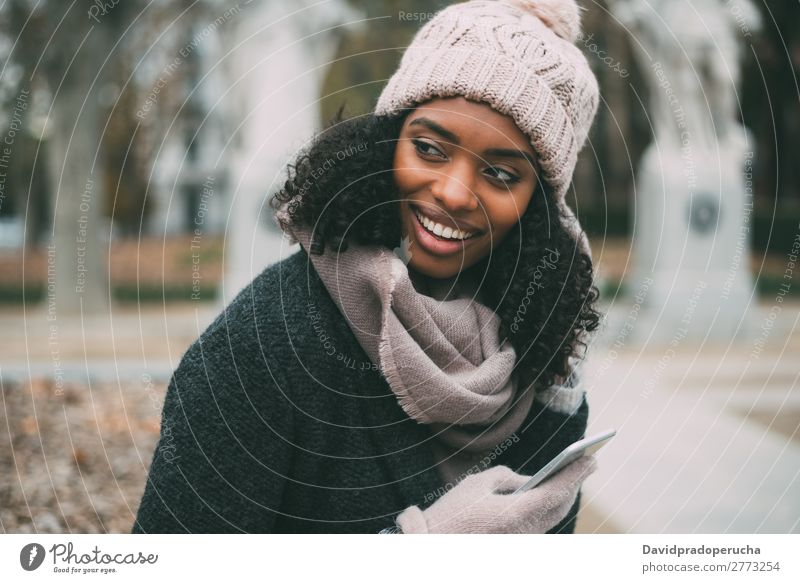 Young black woman on the mobile phone near the royal palace in winter Woman Madrid Vacation & Travel City Town Cellphone Telephone Royal Palace center Spain