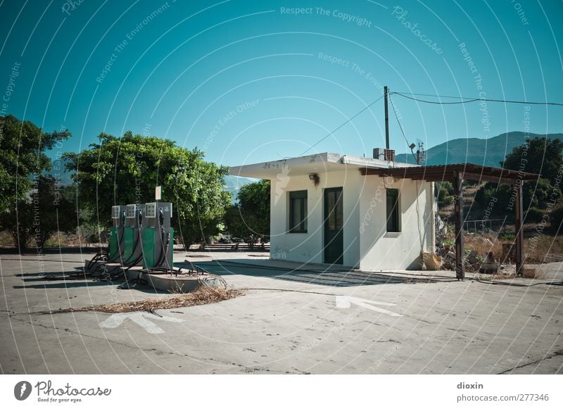 petrol station Petrol pump Sky Cloudless sky Summer Tree House (Residential Structure) Petrol station Transport Motoring Street Old Energy Crisis Deserted