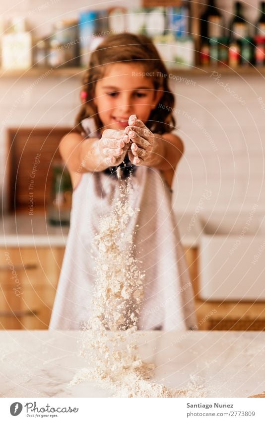 Little child girl kneading dough prepare for baking cookies. Child Girl Cook Cooking Kitchen Flour Chocolate Daughter Day Happy Joy Family & Relations Love