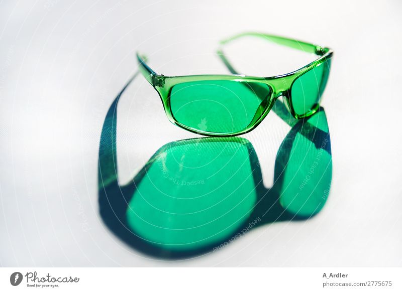 green glasses Lifestyle Elegant Style Design Beautiful Summer Summer vacation Sun Sunbathing Beach Ocean Spring Beautiful weather Fashion Accessory Eyeglasses