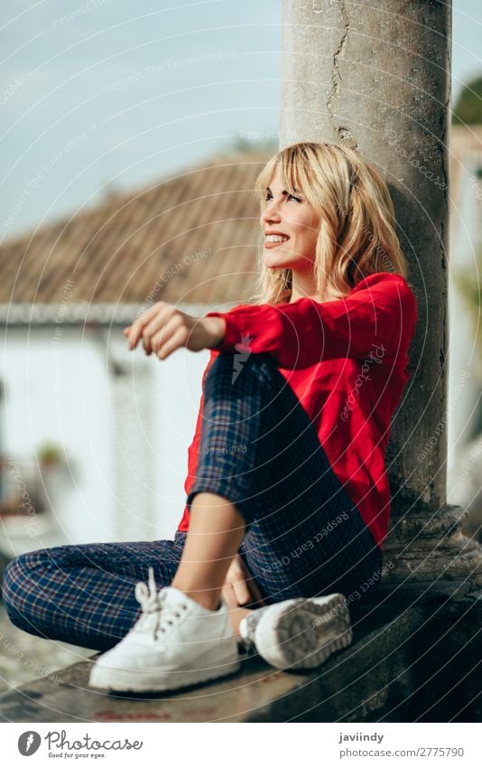 Happy woman sitting on urban background sunbathing Lifestyle Style Beautiful Hair and hairstyles Human being Feminine Young woman Youth (Young adults) Woman