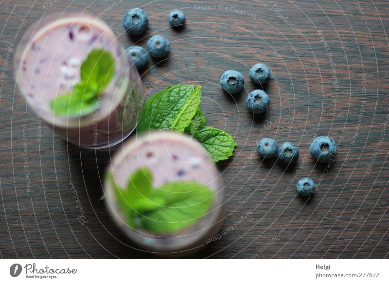 blueberry smoothie... Food Dairy Products Fruit Blueberry Mint leaf Organic produce Vegetarian diet Beverage Cold drink Milk Milkshake Glass Wood Lie Stand