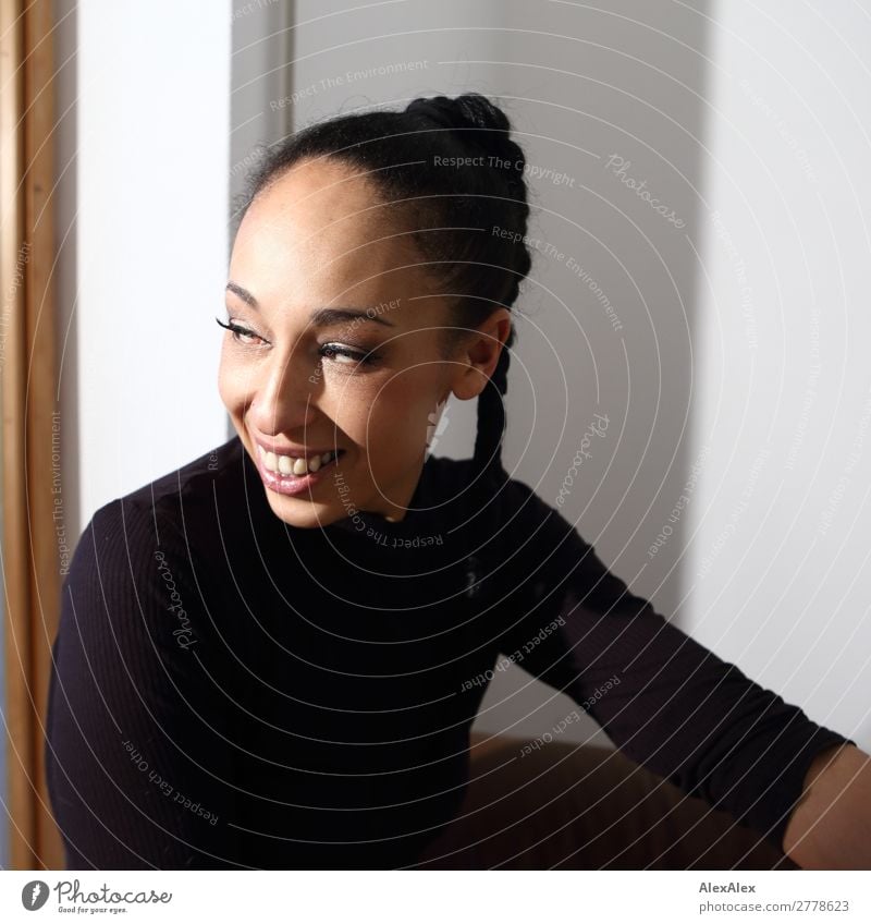 Portrait of a woman with braid Joy Beautiful Contentment Young woman Youth (Young adults) 18 - 30 years Adults 30 - 45 years T-shirt Black-haired Curl Braids