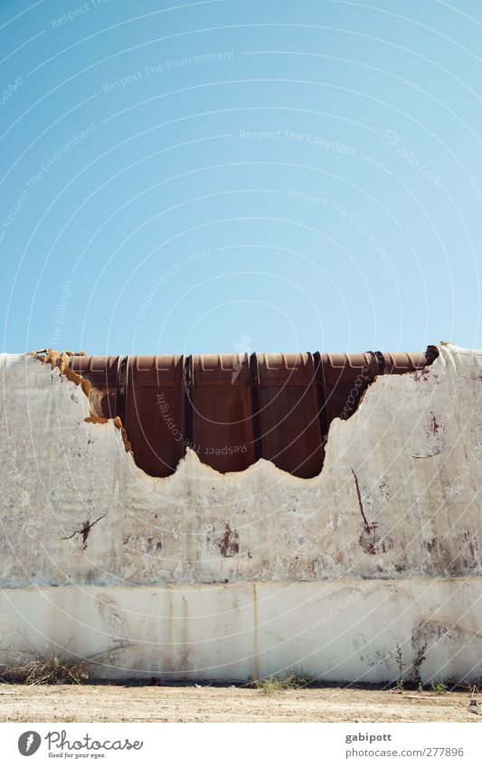 Bite into the roof Sky Cloudless sky Weather Beautiful weather Hut Industrial plant Factory Ruin Building Architecture Facade Roof Old Exceptional Trashy Town