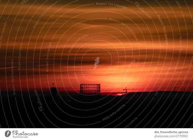 Sunrise over the Gasometer Landscape Sunset Sunlight Winter Berlin Germany Europe Capital city Downtown Skyline Manmade structures Architecture Yellow Orange