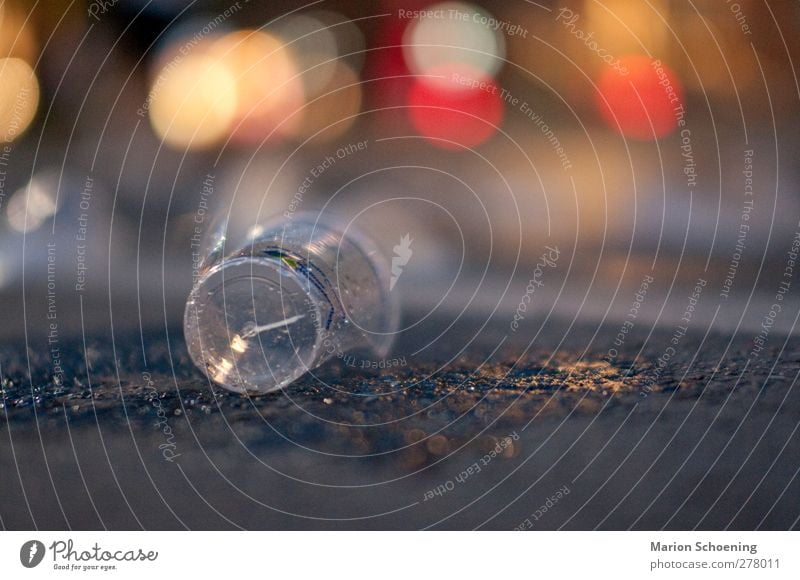 Water cups on the street Mug Colour photo Exterior shot Night Deep depth of field Plastic cup Broken Empty Shackled Copy Space right Plastic waste