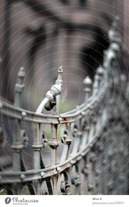 Buckling Old town Decline Fence Wrought ironwork Broken Rust Metalware Colour photo Subdued colour Exterior shot Detail Deserted Shallow depth of field