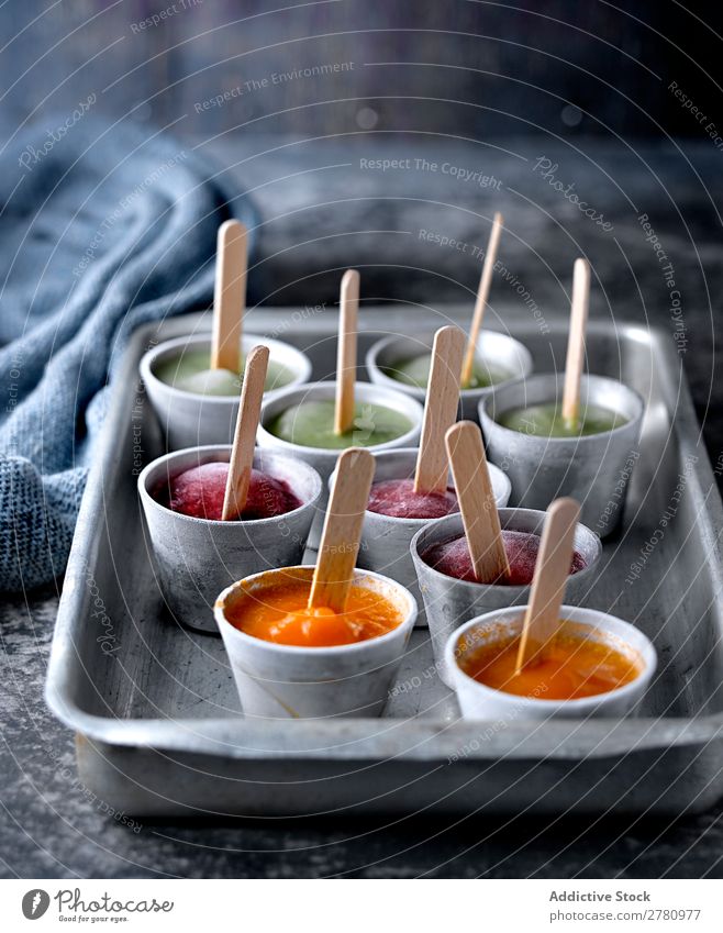 Assorted ice pops on tray Ice Fruit popsicle Cold Stick Food Frozen Summer Colour Bright Home-made Difference Delicious Sweet Snack Dessert Fresh Dog food