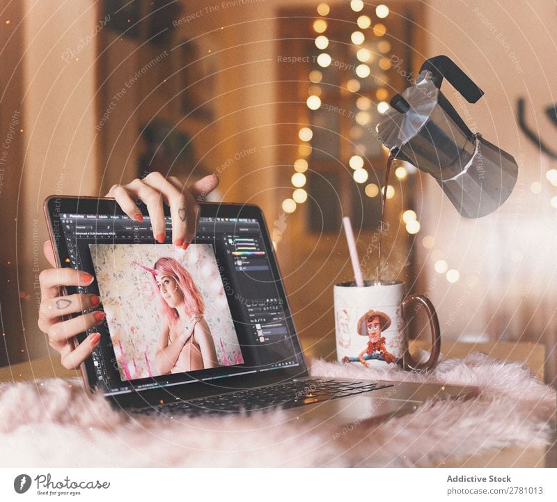 Laptop with nobody's hand and levitating coffee pot Notebook Computer levitates Coffee pot pours Cup Mug Beverage Drinking Tea Hot Fantasy Fly in air Above Bed