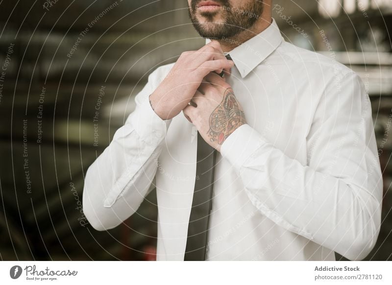 Crop man adjusting tie Man handsome Style Adults Fashion Tie Adjust Human being fashionable Portrait photograph Model Attractive Guy Modern Hip & trendy Macho