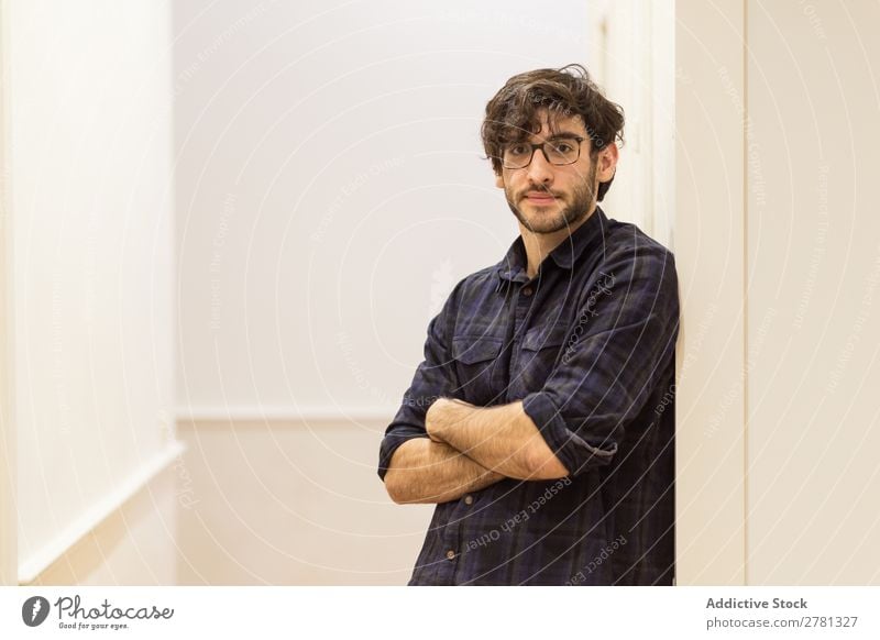 Young man with glasses in shirt posing Man Posture Portrait photograph Gesture Stand Friendliness crossed arms Positive Smiling Looking into the camera