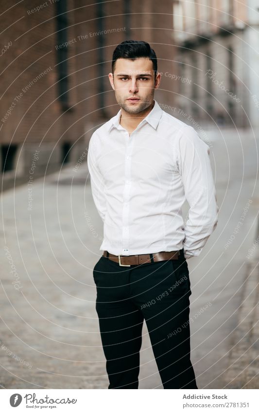 Confident Businessman Standing On Street 20s Adults Attitude Back Behind Black Building Businesspeople Businessperson Caucasian City Self-confident Corporate