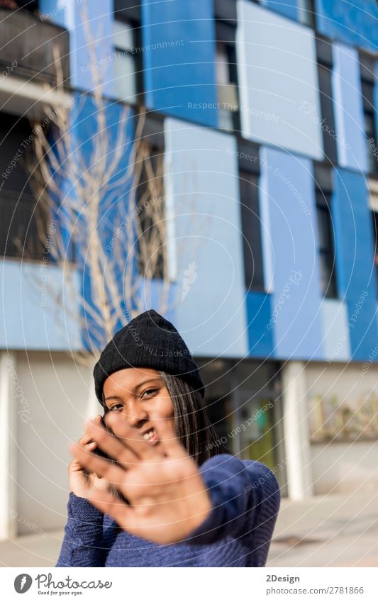 Young beautiful black woman standing outdoors in the city Beautiful Telephone Human being Feminine Young man Youth (Young adults) Woman Adults Hand 1