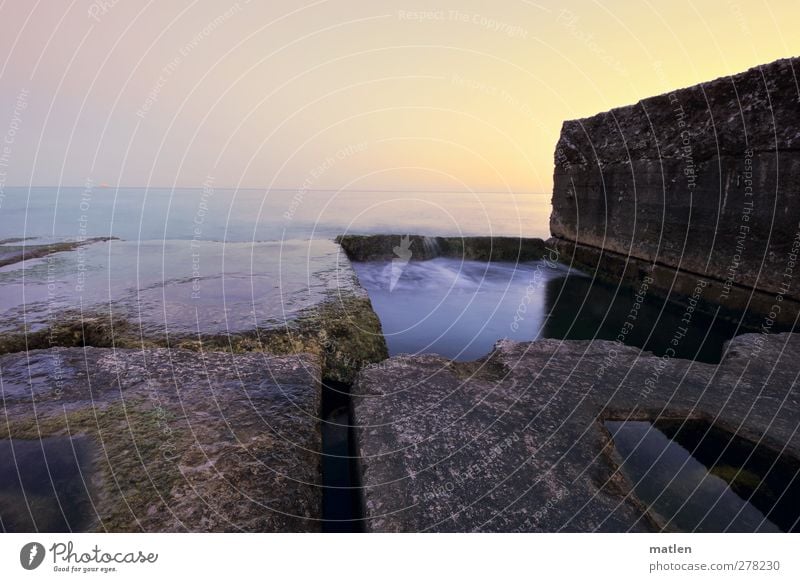 pool Landscape Water Sky Cloudless sky Sunrise Sunset Summer Beautiful weather Rock Coast Ocean Deserted Blue Brown Subdued colour Exterior shot Twilight