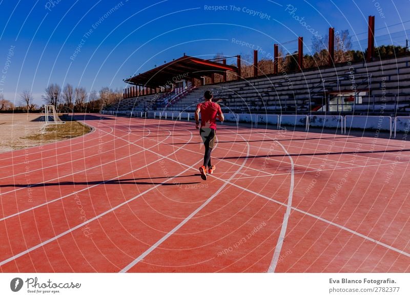 young athlete man running in the lanes. Daylight Lifestyle Leisure and hobbies Sports Jogging Masculine Young man Youth (Young adults) Man Adults 1 Human being