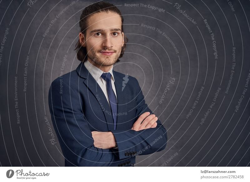 Young man in suit with arms crossed Face Decoration Business Man Adults 1 Human being 18 - 30 years Youth (Young adults) Suit Tie Stand Modern student