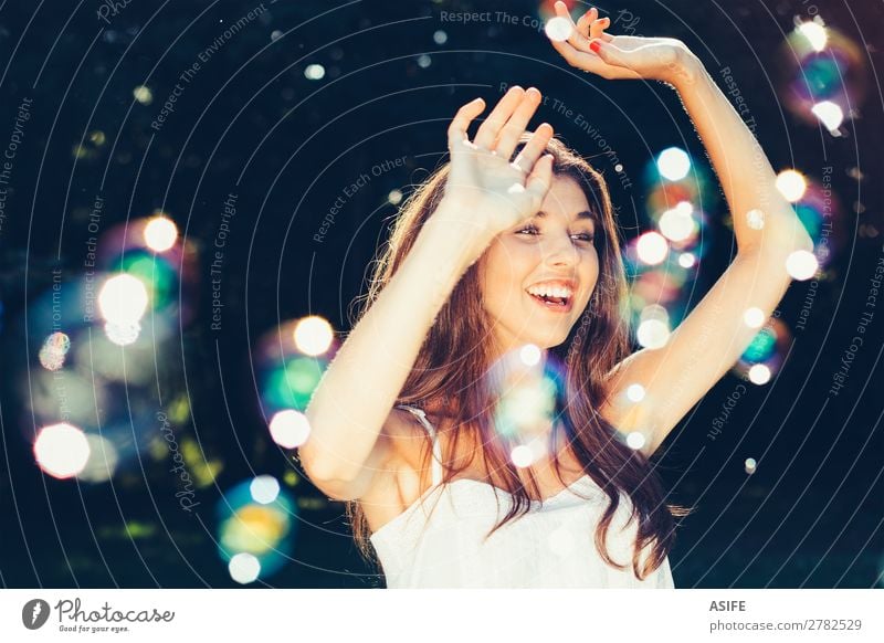 Girl dancing with bubbles Joy Happy Beautiful Playing Summer Feasts & Celebrations Human being Woman Adults Nature Warmth Park Dream Happiness Soft Green Soap