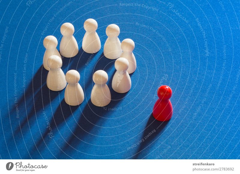 Red playing piece stands outside a circle of white playing pieces on a blue background Playing Group Toys Piece Wood Select Sadness Round Blue Pink White Agreed