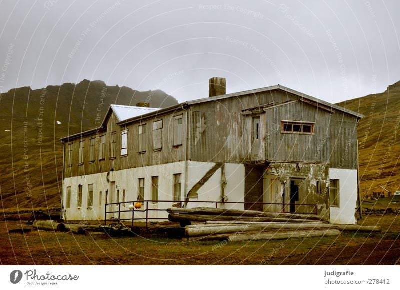 Iceland Nature Landscape Climate Weather Westfjord Village Port City Deserted Hut Manmade structures Building Dark Decline Past Transience Change Colour photo