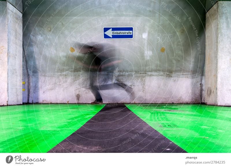 blurred against the wall Human being Man Adults 1 Wall (barrier) Wall (building) Signs and labeling Road sign Running Exceptional Speed Gray Green Endurance