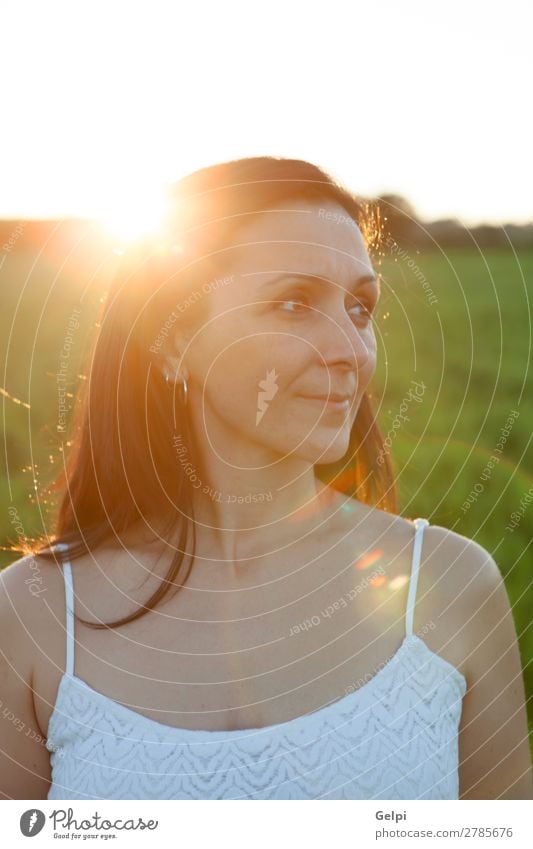 Woman looking at side relaxing on a meadow Lifestyle Joy Happy Beautiful Face Wellness Relaxation Vacation & Travel Summer Sun Human being Adults Nature Park